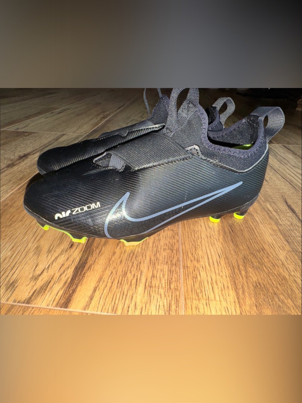 Nike Black Soccer Cleats with Neon Yellow Accents